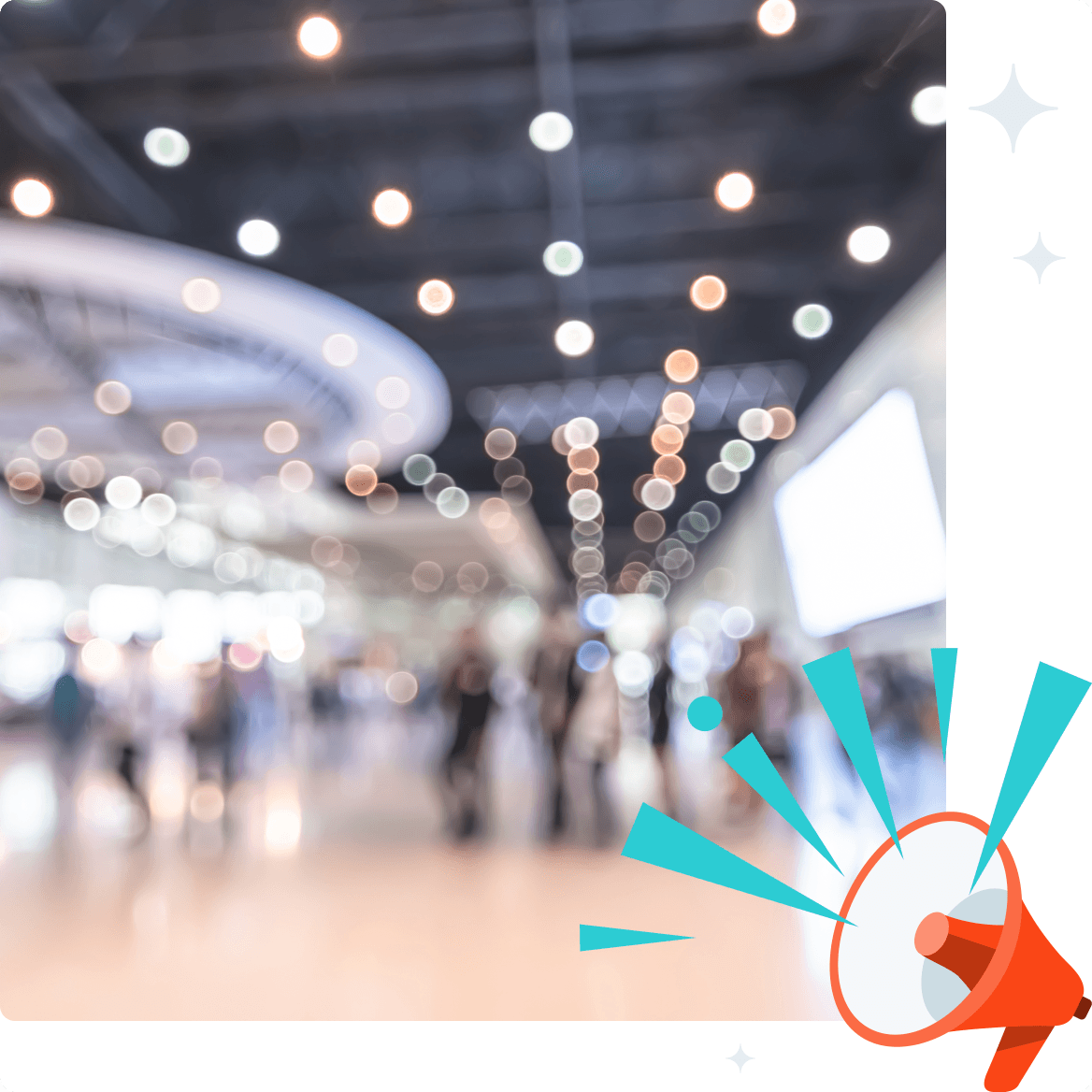 An orange megaphone with sound waves in front of a blurry background of a crowded hall.